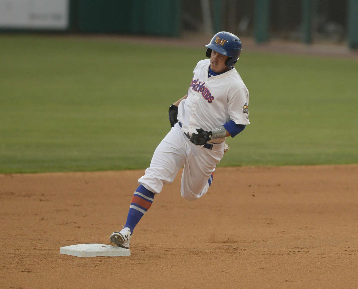 RockHounds' Wade Kirkland rounds the bases on a triple against San Antonio Missions on Wednesday, June 15, 2016, at Security Bank Ballpark. James Durbin/Reporter-Telegram