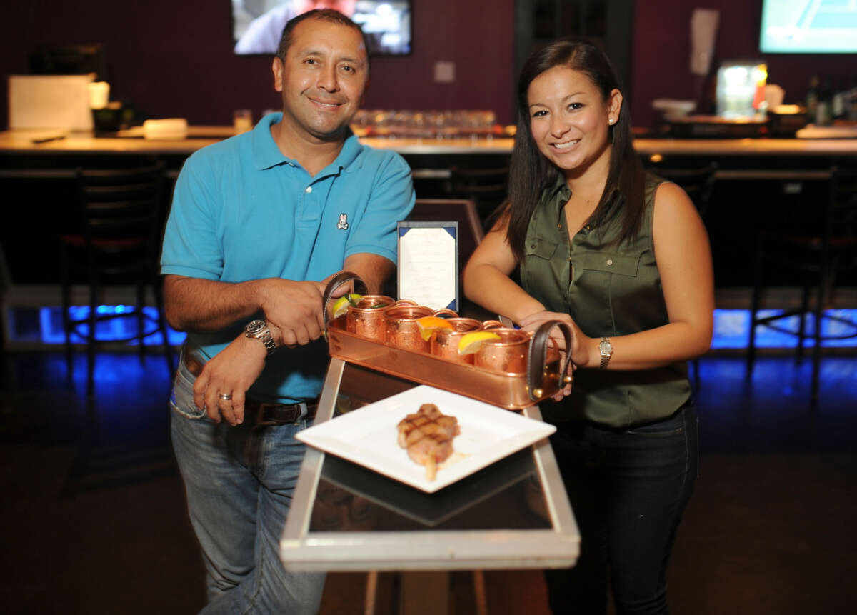 Co-owners of Steak 42 restaurant JB Sosa (right) and her brother-in-law Richard Padilla (left), photographed for Midland magazine August 30, 2016. James Durbin/Reporter-Telegram