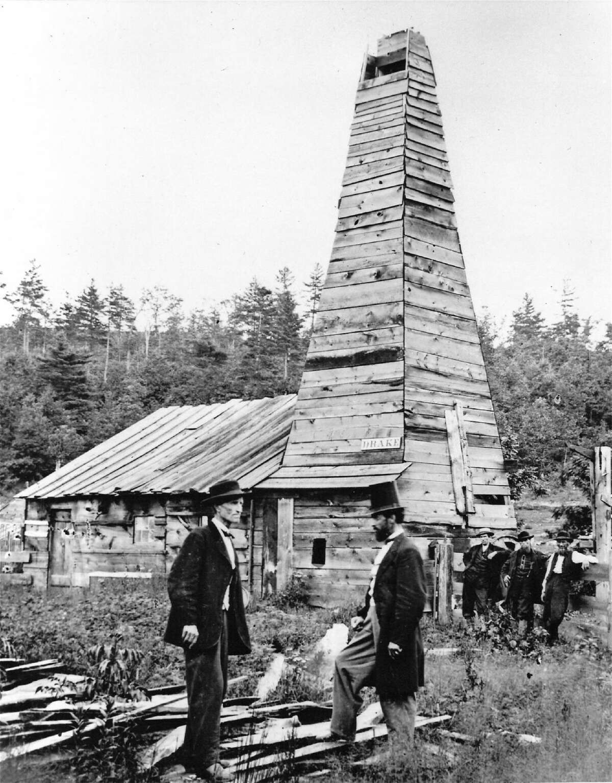 DW676 - Edwin L. Drake (right) in front of the Drake Well engine house in 1861.