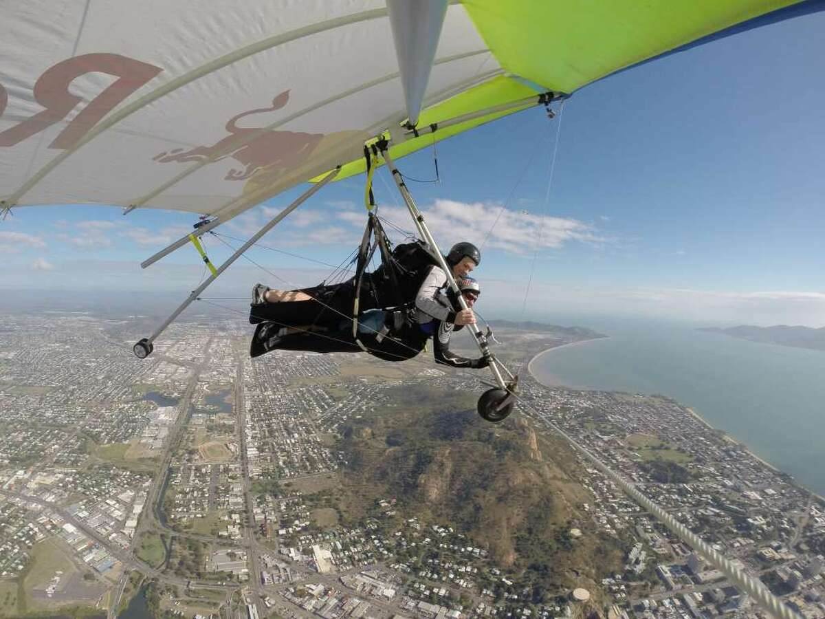 Red Bull Racing Australia driver, Craig Lowndes, and world-record holding hang-glider Jonny Durand took to the skies ahead of the Townsville 500 in Townsville, Australia on July 3, 2014.