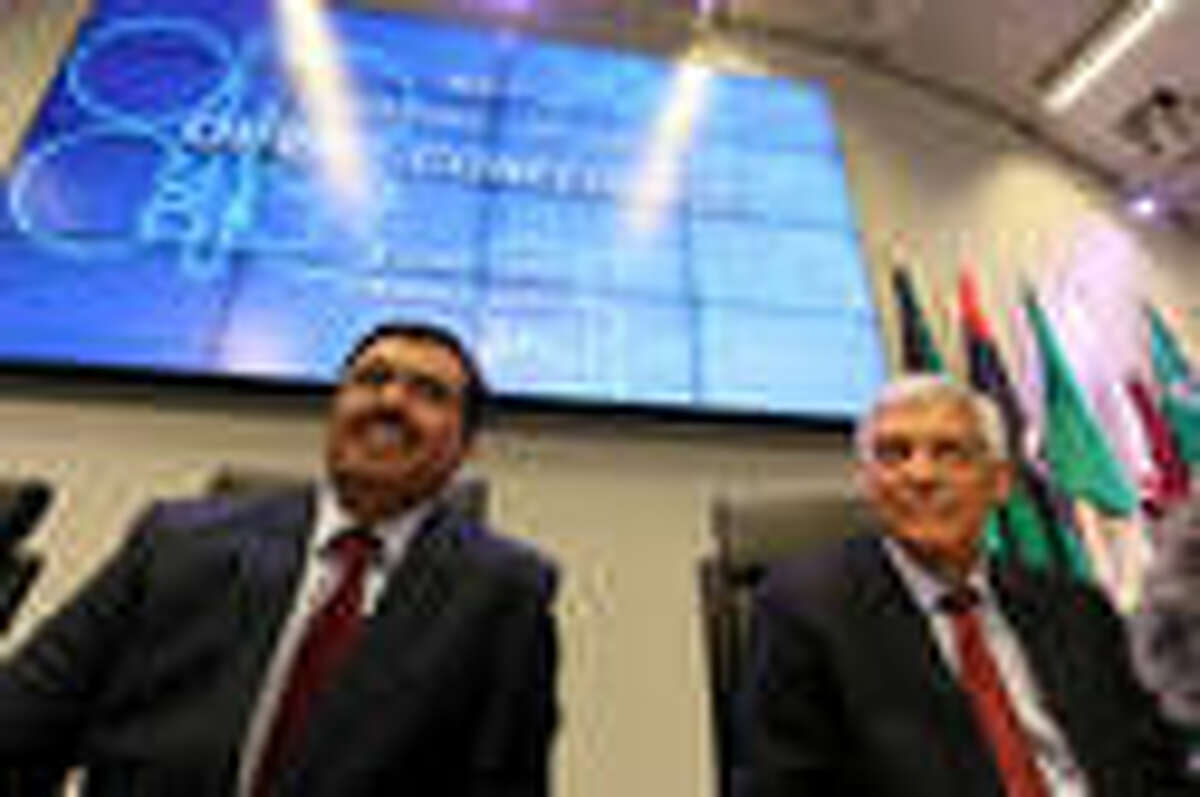 Mohammed Bin Saleh Al-Sada, Minister of Energy and Industry of Qatar and President of the OPEC Conference, and OPEC's Secretary General Abdalla Salem El-Badri, from Libya, from left, speaks to journalists before the start of a meeting of the Organization of the Petroleum Exporting Countries today at their headquarters in Vienna, Austria.