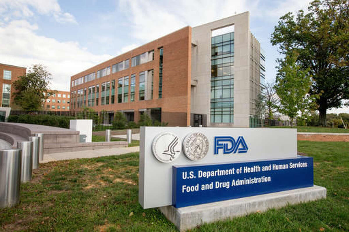 FILE - This Oct. 14, 2015, file photo, shows the Food & Drug Administration campus in Silver Spring, Md. The FDA is reconsidering whether doctors who prescribe painkillers like OxyContin should be required to take safety training courses, according to federal documents released Friday, April 29, 2016. (AP Photo/Andrew Harnik, File)