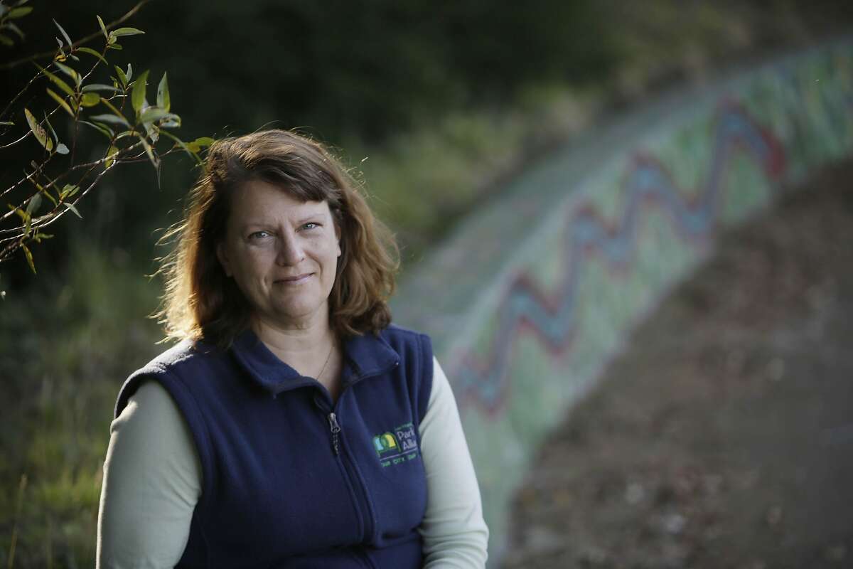 Rachel Norton, Interim chief executive officer San Francisco Parks Alliance stands for a portrait next to next to a mosaic wall installed at McLaren Park on Friday, September 23, 2016 in San Francisco, California.