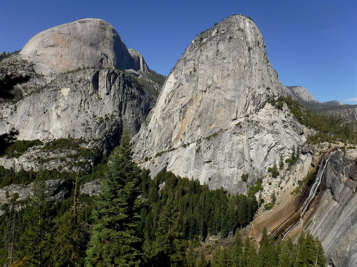 On a loop hike from Yosemite Valley, you can get this view of 7,076-foot Liberty Cap, the little-seen south flank of 8,842-foot Half Dome and it shoulder, and below to 594-foot Nevada Fall.