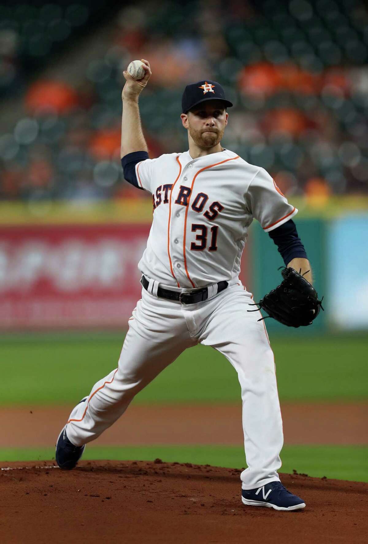 Houston Astros starting pitcher Collin McHugh (31) pitches in the first inning of an MLB game at Minute Maid Park, Monday, Sept. 26, 2016 in Houston.