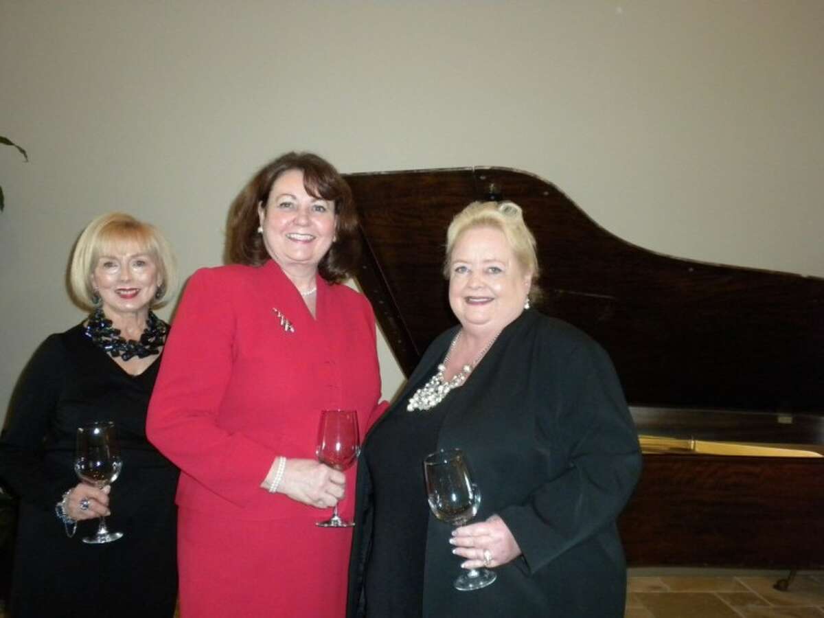 Busy planning for Sugar Creek Women’s Association’s “Midnight in Paris” scheduled for Jan. 26 are (left to right) Bonnie Steidley, SCWA President Marilyn Davis and Annette Deitch.