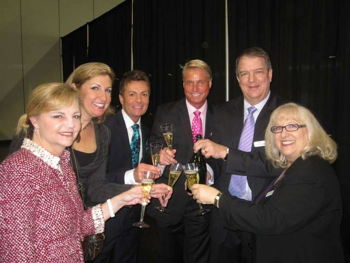 Before he hopped his flight back to New York City, fashion designer Randy Feloni celebrated with Jo Ann and John Woodward, owner’s of Schartz & Woodward and Memorial residents, and Laurette Veres, Bridal Extravaganza Show Producer. Pictured from left to right: Kim Padgett; Laurette Veres, show producer; Randy Fenoli; Dennis Johnson, Fenoli’s manager; John and Jo Ann Woodward, owner’s of Schwartz & Woodward and Memorial residents. (Photo courtesy of Bridal Extravaganza Show)