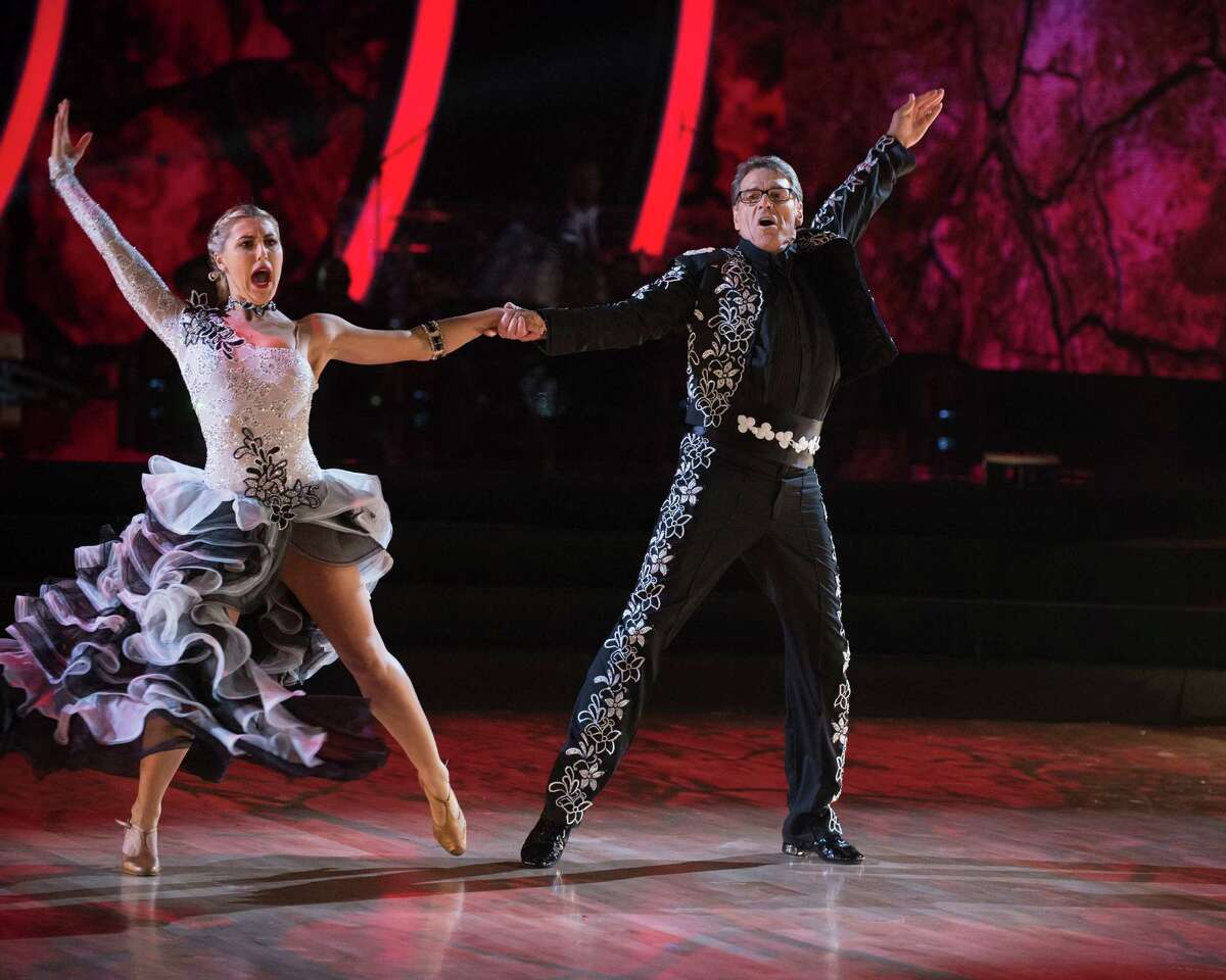 Former governor of Texas, Rick Perry, dances the paso doble with partner Emma Slater during the live Sept. 26, 2016, broadcast of "Dancing with the Stars" on ABC.