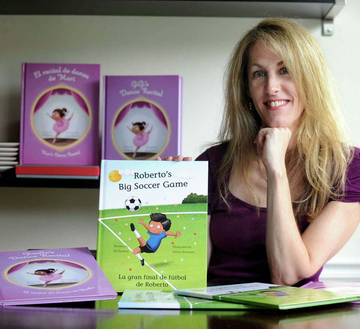 Jill Barletti, of Danbury, writes children's books that can be personalized depending on ethnicity and sexual orientation of parents. Her most recent book is "The Big Soccer Game." Photo, Sept. 23, 2016.