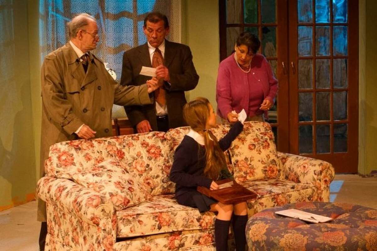 Pondering over the murder of malicious Oliver in Agatha Christie's "Spider Web" at Clear Creek Community Theatre, are friends Hugo Birch (Bob Peeples), Sir Rowland Delahaye (John Lazo), Clarissa Hailsham (C. Alane Johnson) and step-daughter Pippa (Sonja Kozuch). The fascinating play runs weekends through Sunday, January 27. Call 281-335-5228 for information and reservations soon.