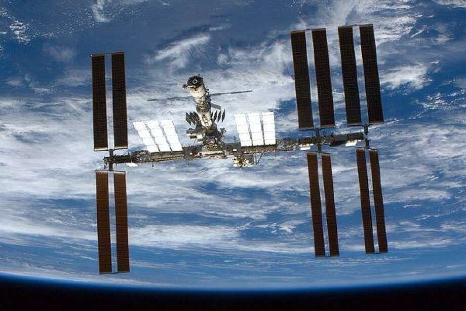 The International Space Station drifts into low Earth orbit.

Keep seeing recent photos of the Earth since the ISS.