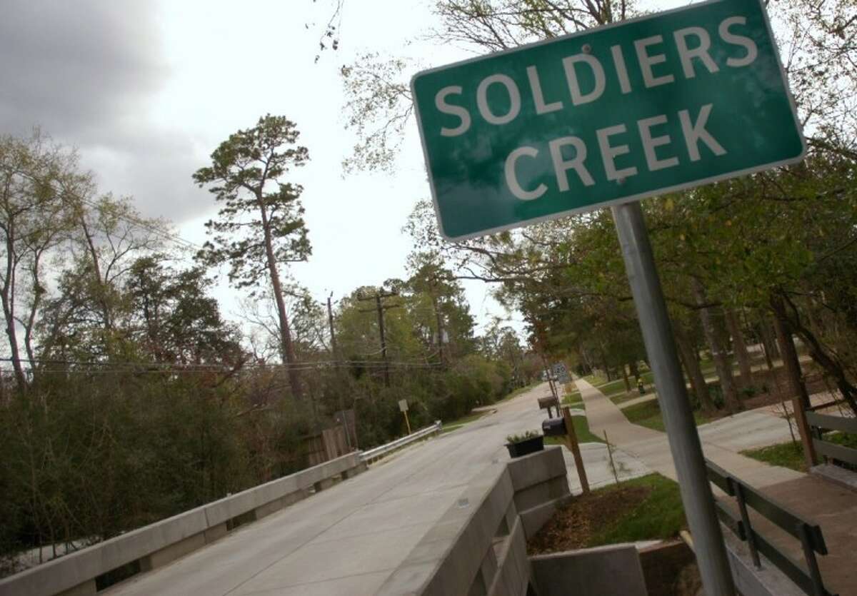 Stormwater from Soldiers Creek is diverted south (shown) along Hedwig Road. Piney Point Village owns the roadway and is to the west (right in photo); Hunters Creek is east of Hedwig Road.