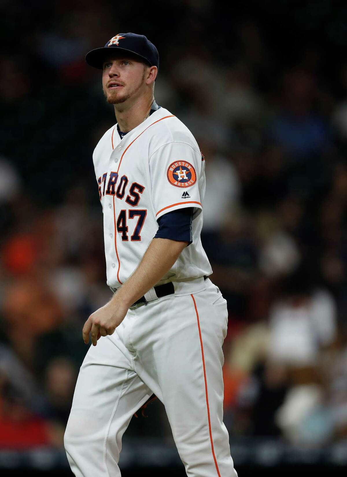 Houston Astros relief pitcher Chris Devenski (47) reacts after striking out Seattle Mariners Nelson Cruz to get out of the seventh inning of an MLB game at Minute Maid Park, Tuesday, Sept. 27, 2016 in Houston.