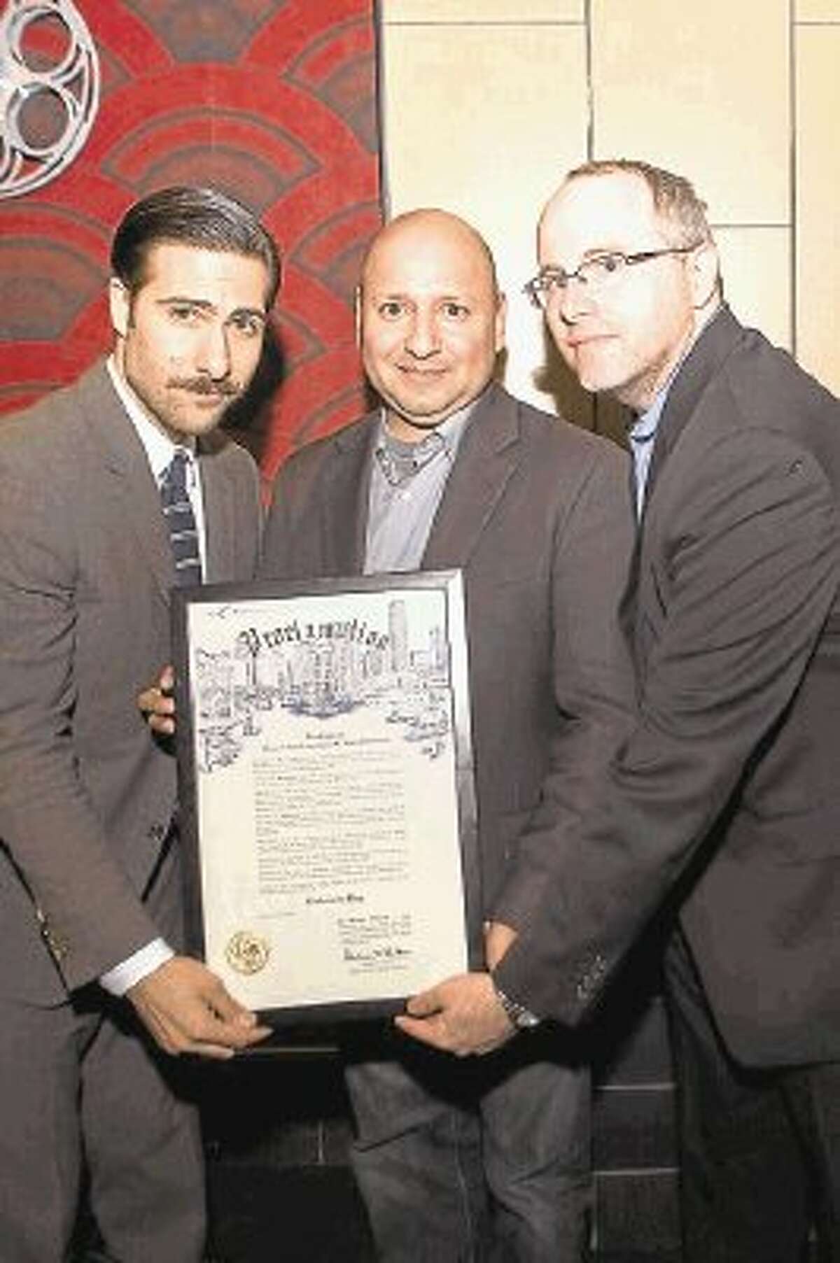 Schwartzman (left) was presented a proclamation by the City of Houston for the official Rushmore Day from Alfred Cervantes of the Houston Film Commission and Joshua Starnes of the Houston Film Critics Society.