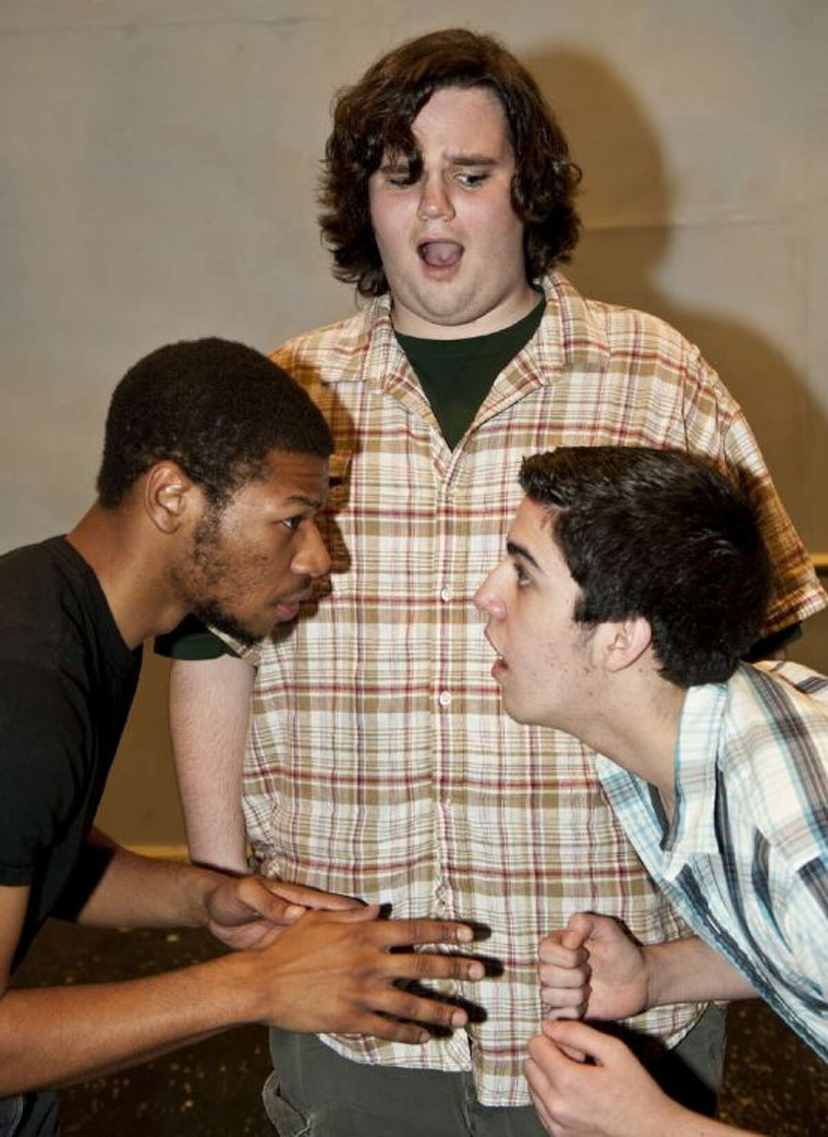 King Sextimus the Silent (left, Dillon Dewitt of Alvin) begins to tell his grown son, Prince Dauntless the Drab (right, Chase Folwell of Dickinson) about the birds and the bees, while the Court Jester (Sammie Ford of Dickinson) looks on in a rehearsal of Alvin Community College’s production of the lighthearted musical Once Upon a Mattress.