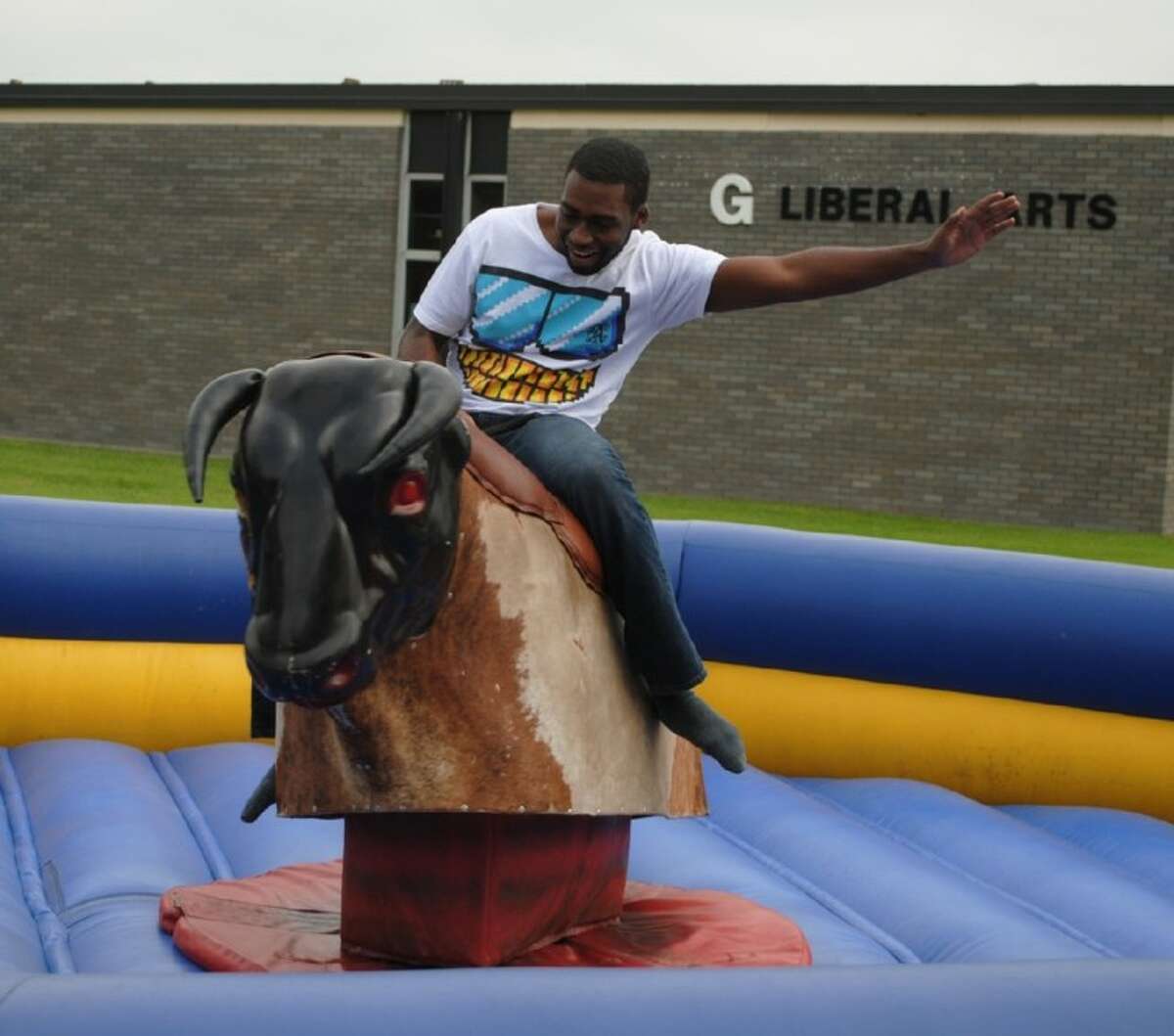 Mechanical bull riding between classes? ACC students cowboy-up 15 ...