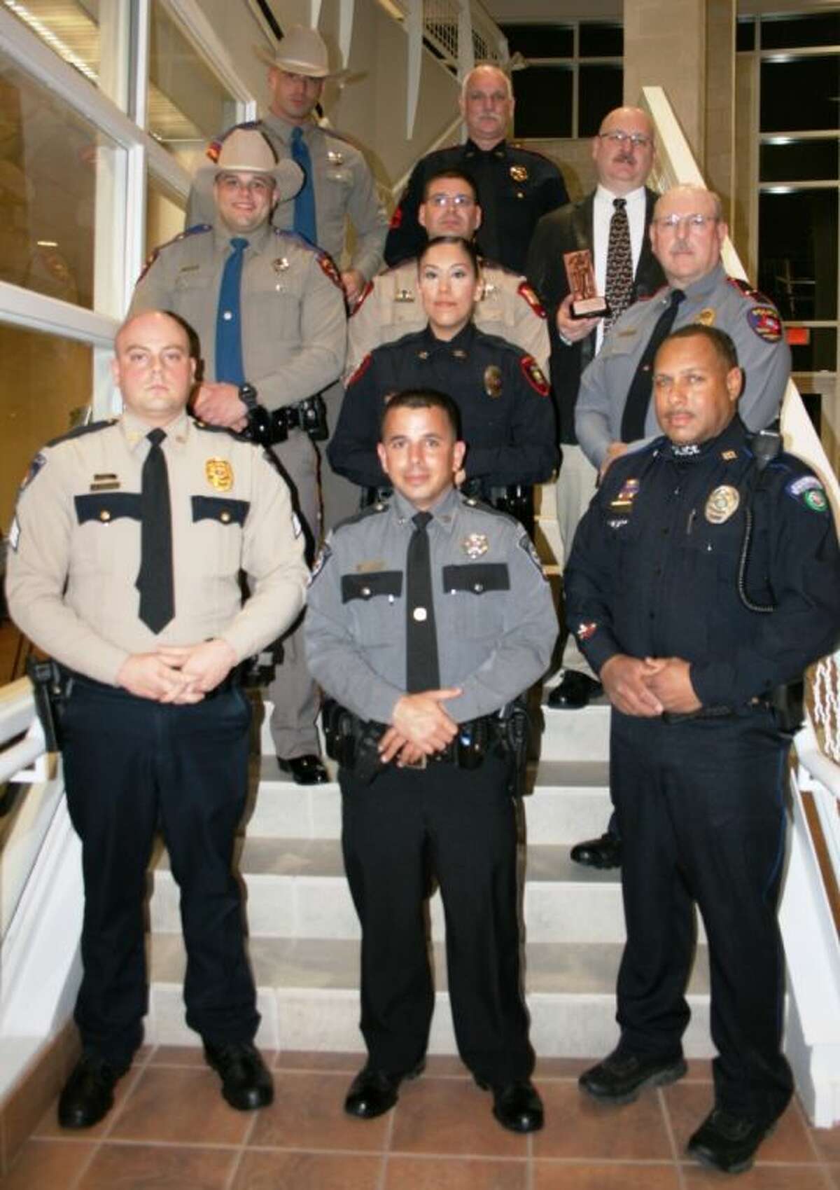 East Montgomery County law enforcement officers, including Deputy Jesse Bullinger, Detective Sgt. Steve Mullins, Deputy Robert Layman, Sgt. Dimitri Jasonis, Officer Phillip Balthazar, Lt. John Mays, Officer Lori Rodriguez, Sgt. Robert Meager, Sr., Troopers Derek Peterson and John Sullivan, all received Officer of the Year awards for their individual departments.