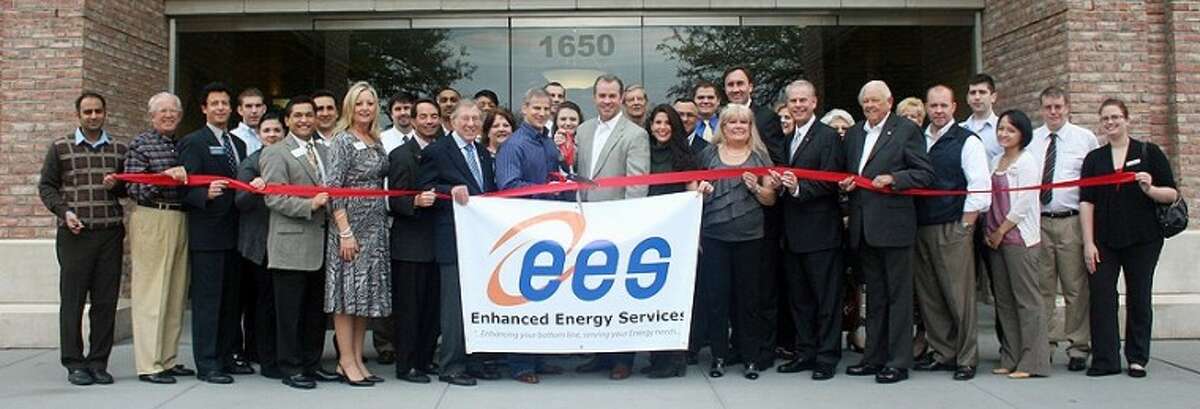 Enhanced Energy Services (1650 Hwy. 6, Ste. 120, Sugar Land) recently held its ribbon-cutting ceremony with the Central Fort Bend Chamber Alliance. Pictured from the left are Tom Wilson, Reading Road Storage; Brian Ellis, Houston Community Bank; Gilbert Limones, First Victoria National Bank; Darrell Karnop, Network Funding, LP; Shanta Kuhl, Chamber President/CEO; Derek Finley, WJ Interests; Tom Crayton, Thomas J. Crayton, CPA; Stafford Mayor Leonard Scarcella; Erica Tirado, First Victoria National Bank; Mary Doettryl, Fort Bend Focus; Bill Glass, Enhanced Energy Services; Chris Prejean, Enhanced Energy Services; Angie Prejean; Robert Quarles, Enhanced Energy Services; Matt Ontiveros, Rosenberg Marriott Springhill Suites; Rene Hightower, Enhanced Energy Services; U.S. Representative Pete Olson, Dist. 22; Suzanne Loehr, Stieber Insurance Group; Rosenberg Mayor Vincent Morales; Sugar land Councilman Don Smithers.
