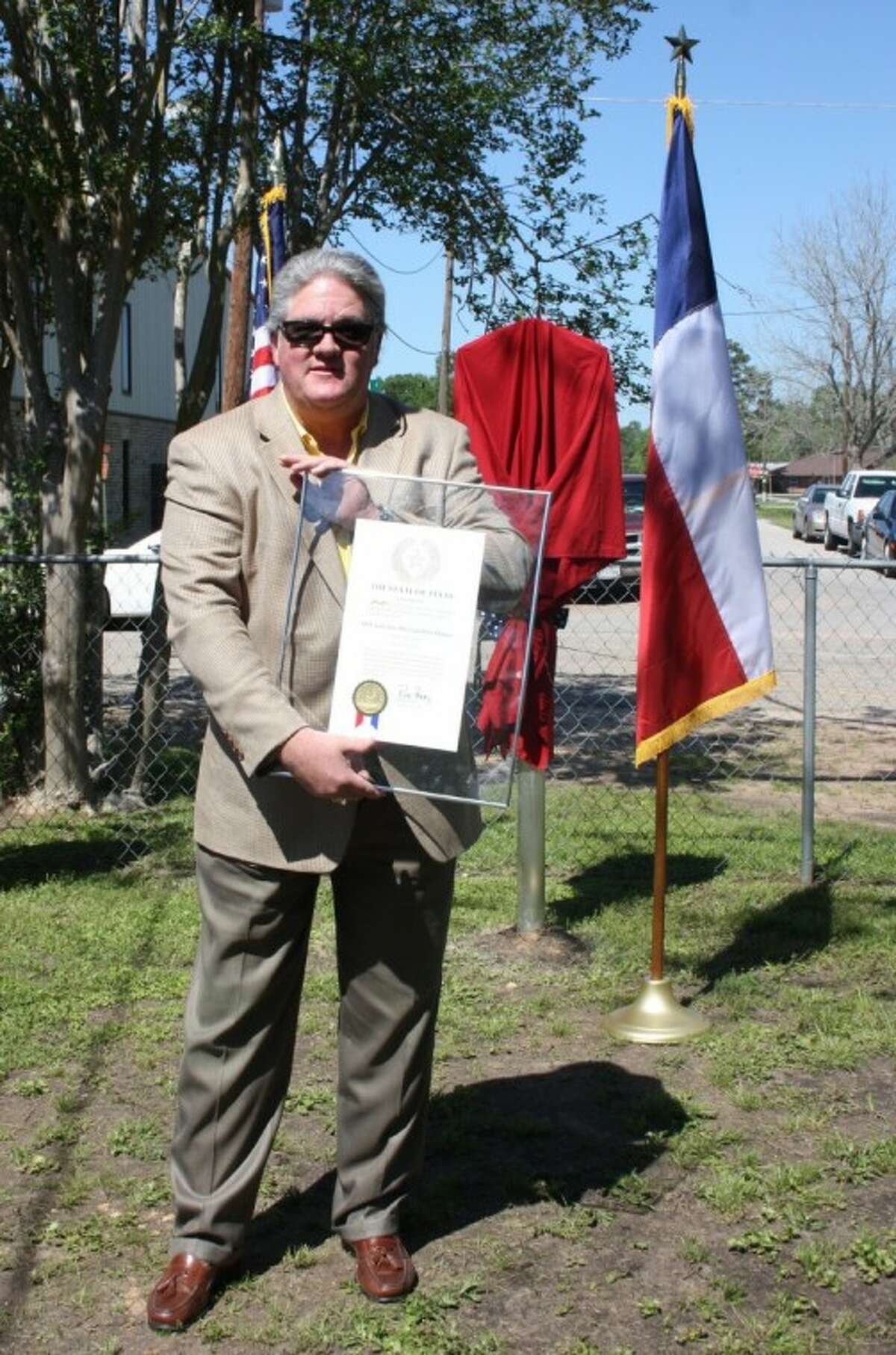 Liberty County Judge Craig McNair read a proclamation from Gov. Rick Perry at the Texas Historic Landmark dedication.