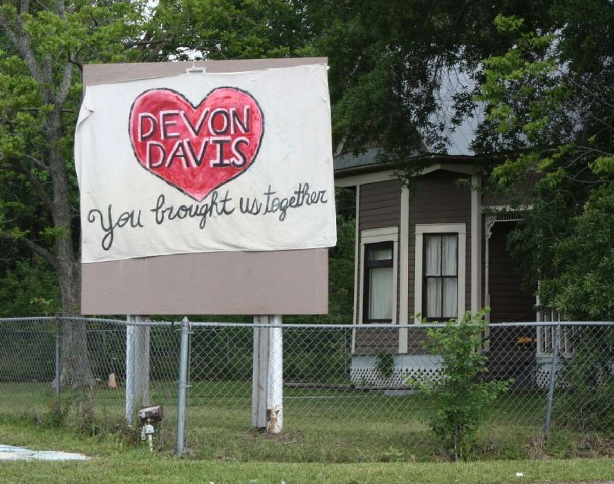 A homeowner on Houston Street in Cleveland has posted a banner in front of their home in honor of 2-year-old Devon Davis, whose body was found floating in a lake in Sam Houston Lake Estates on March 31, days after he disappeared from his family’s home.