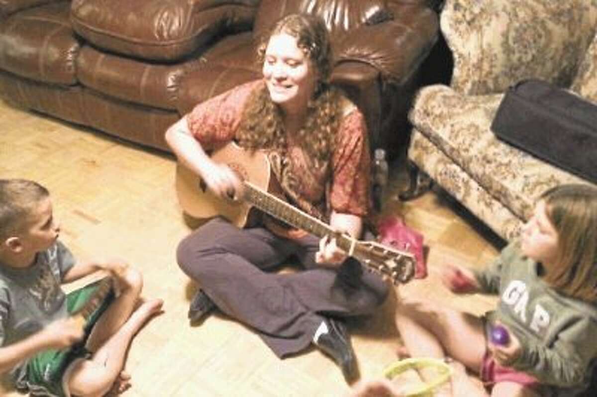 Local music therapist, Amanda Bayless, plays many instruments, including guitar, saxophone and piano. She incorporates these instruments, as well as many others, into her musical therapy lessons.