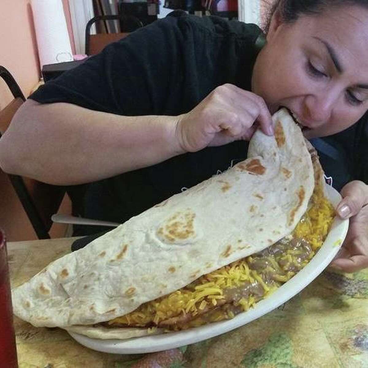 Chachos Tacos in Corpus Christi challenges customers to eat a nearly 4-pound taco in 10 minutes. 
