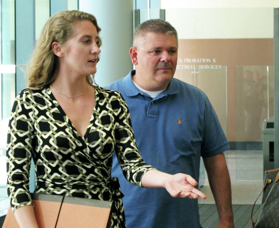Kevin Schuler, right, leaves U.S. District Court in Buffalo, N.Y., Thursday, Sept. 22, 2016, after posting bond following an appearance in a corruption probe. The LPCiminelli vice president was among eight people charged in a bribery and fraud case connected to Gov. Andrew Cuomo's efforts to revitalize the upstate New York economy. (AP Photo/Carolyn Thompson) ORG XMIT: NYR104 Photo: Carolyn Thompson / Copyright 2016 The Associated Press. All rights reserved.