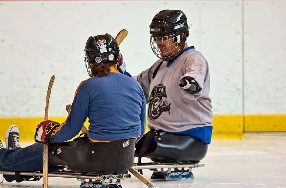 PHOTO BY FRED TRASK: Joseph Montemayor began playing Sled Hockey about three months ago, each Saturday at the Memorial City Mall.