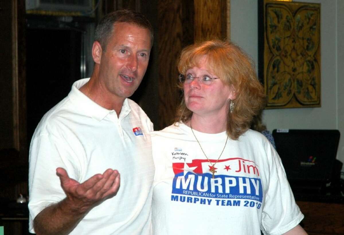 Jim Murphy, with his wife, Kathleen, addresses supporters Tuesday night at George's Pasteria.