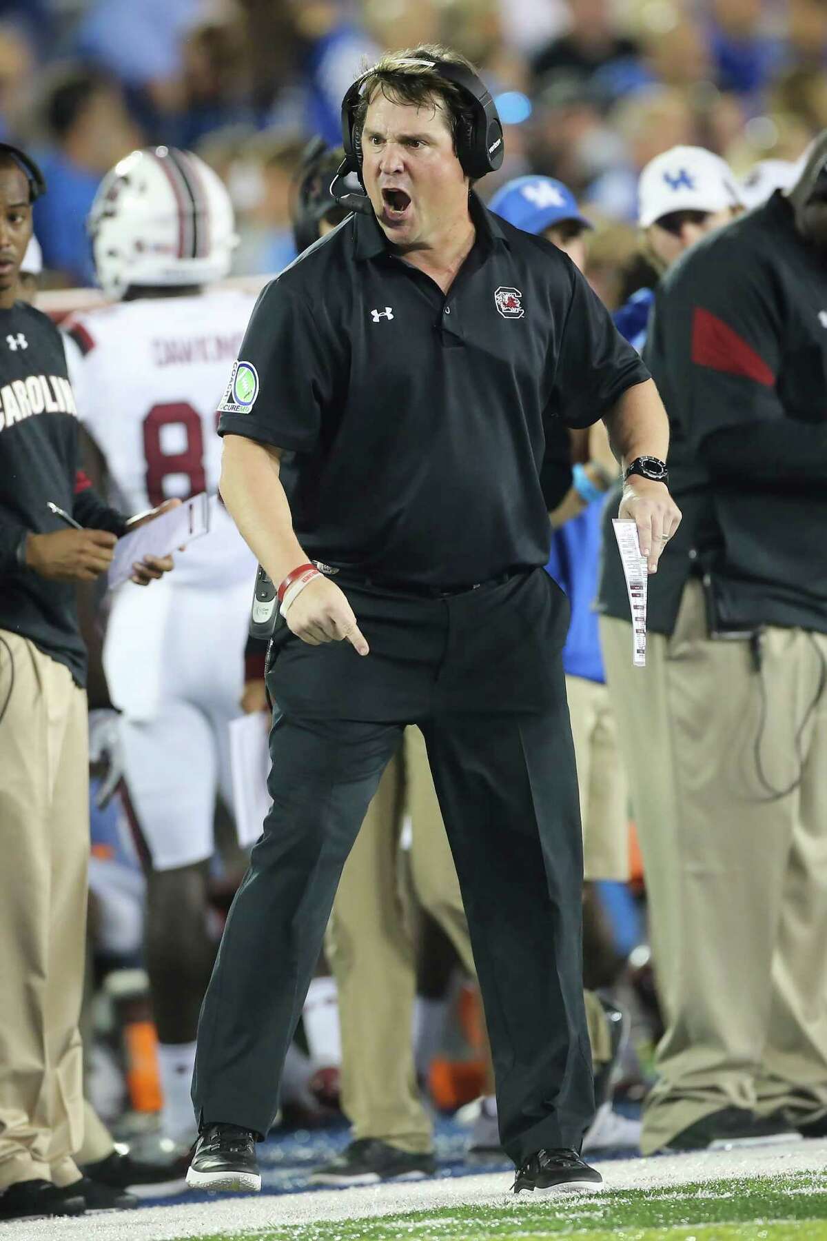 Will Muschamp is his usual feisty self but faces a lot of frustrating times trying to rebuild a South Carolina program that fell to 3-9 last season.