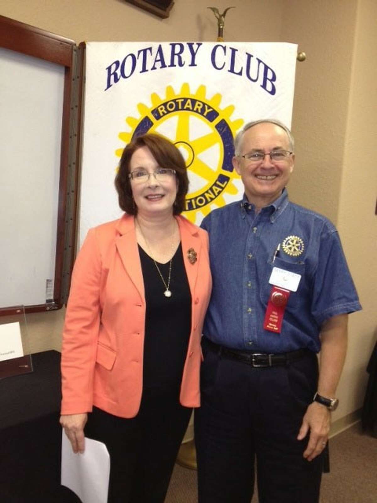 Pictured from left to right are Dr. Loveland and Club President Gerry Stacy.