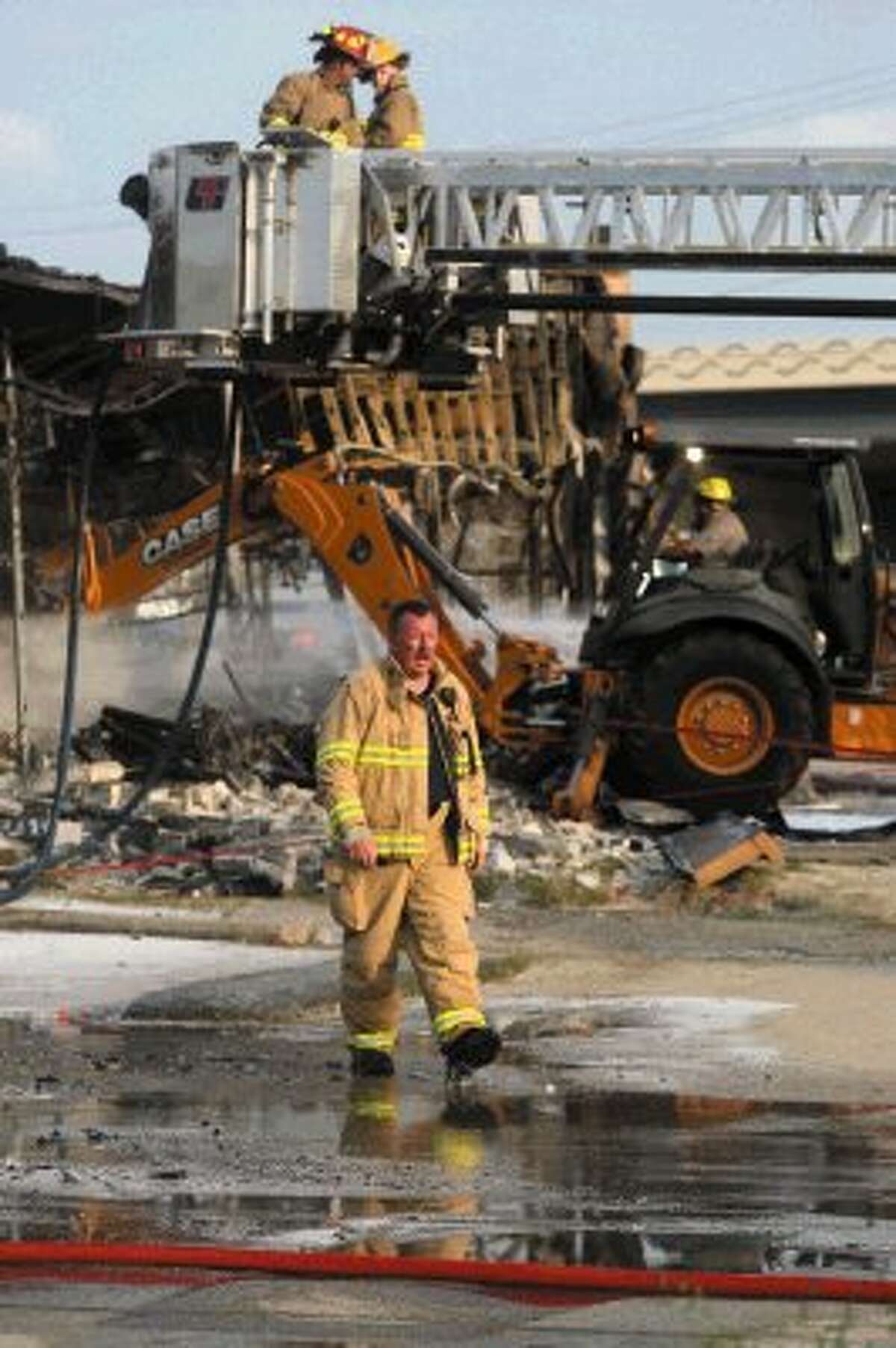 Two injured at dry cleaners fire