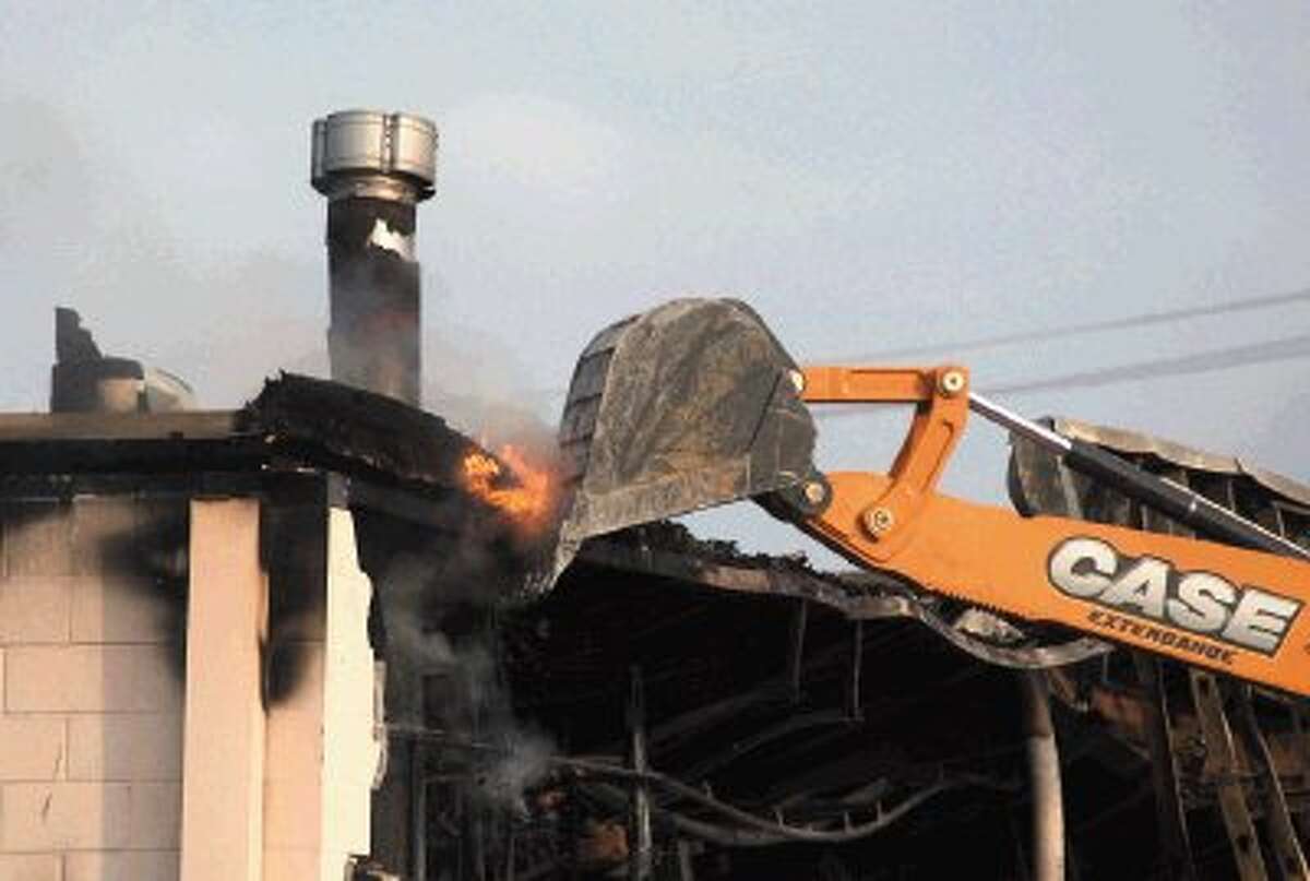 Two injured at dry cleaners fire