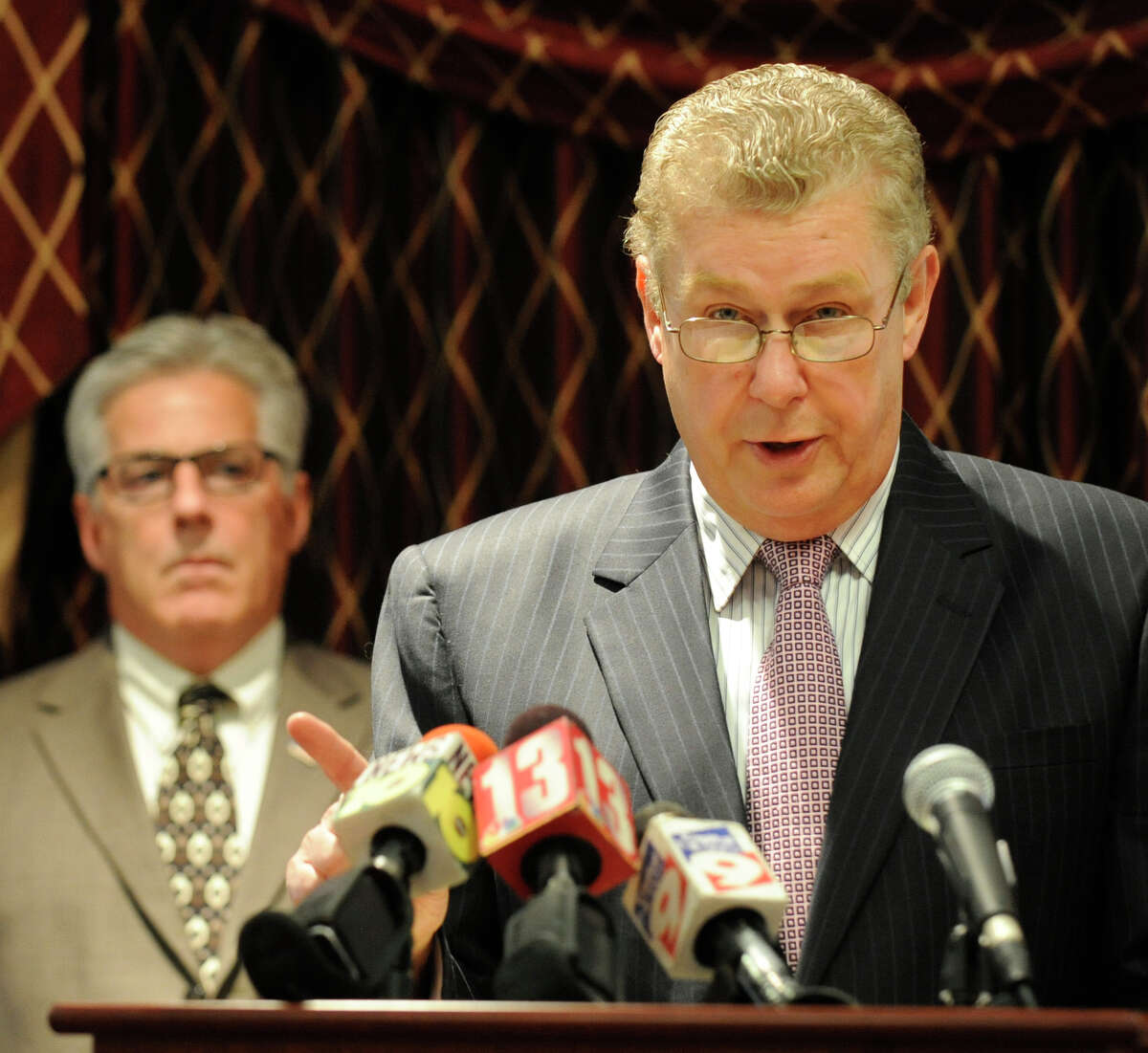 Tom Wade, Rensselaer County Democratic Party Chair(r) speaks during a press conference at the Hilton Garden Inn in Troy, New York about alleged improprieties in voting by the RENSCO Republican Party October 5, 2009. In the background is Troy City Councilman Clem "Chappy" Campana.(Skip Dickstein/Times Union)