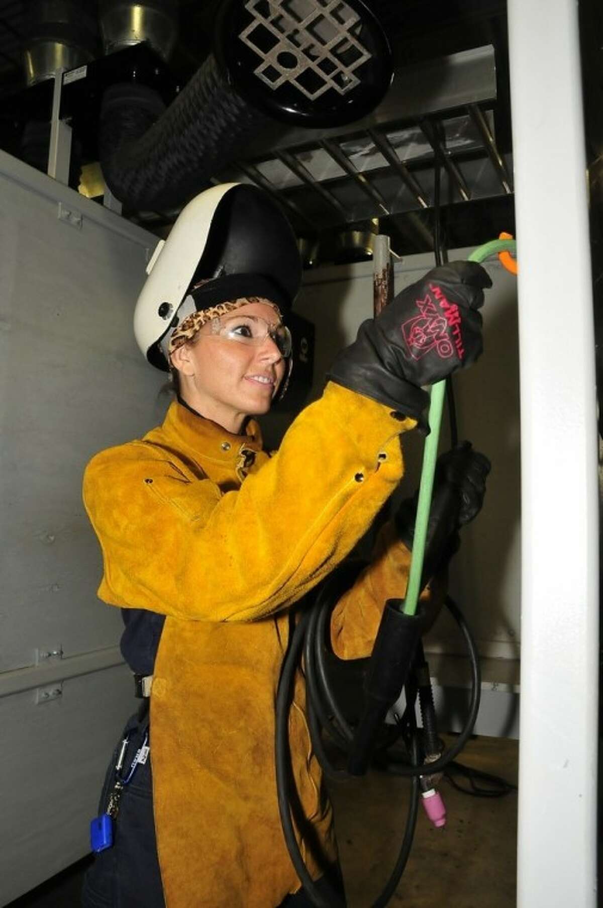 Amber Gell of Clear Lake, an experiment support scientist working on the International Space Station Medical Project, spends her evenings in welding class at San Jacinto College to learn the skill for various research projects related to human space flight.