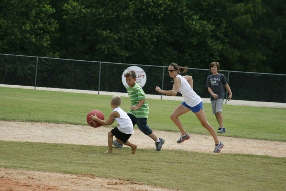 Kicking it for Marcus Local residents gather for kickball tournament