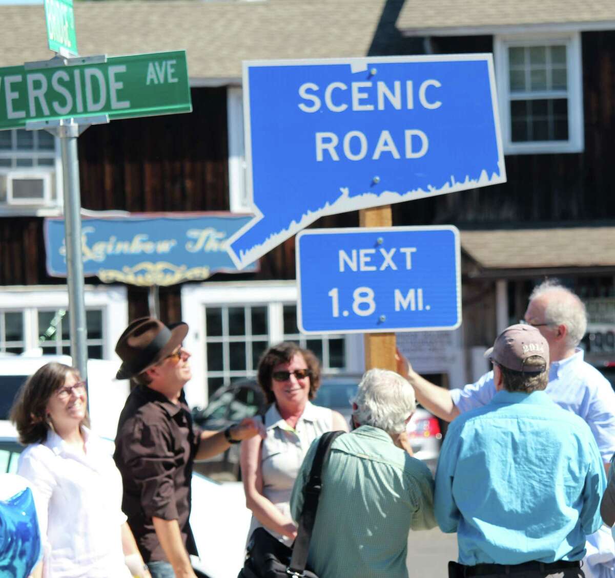 Morley Boyd and John Suggs admire the nelwy implemented scenic road sign on Route 136. The 1.8 mile scenic road, only the second in Westport, starts at the west end of the Bridge Street Bridge, officially known as the William F. Cribari Memorial Bridge.The designation runs until Route 136 intersects with the Post Road and Compo Road S.