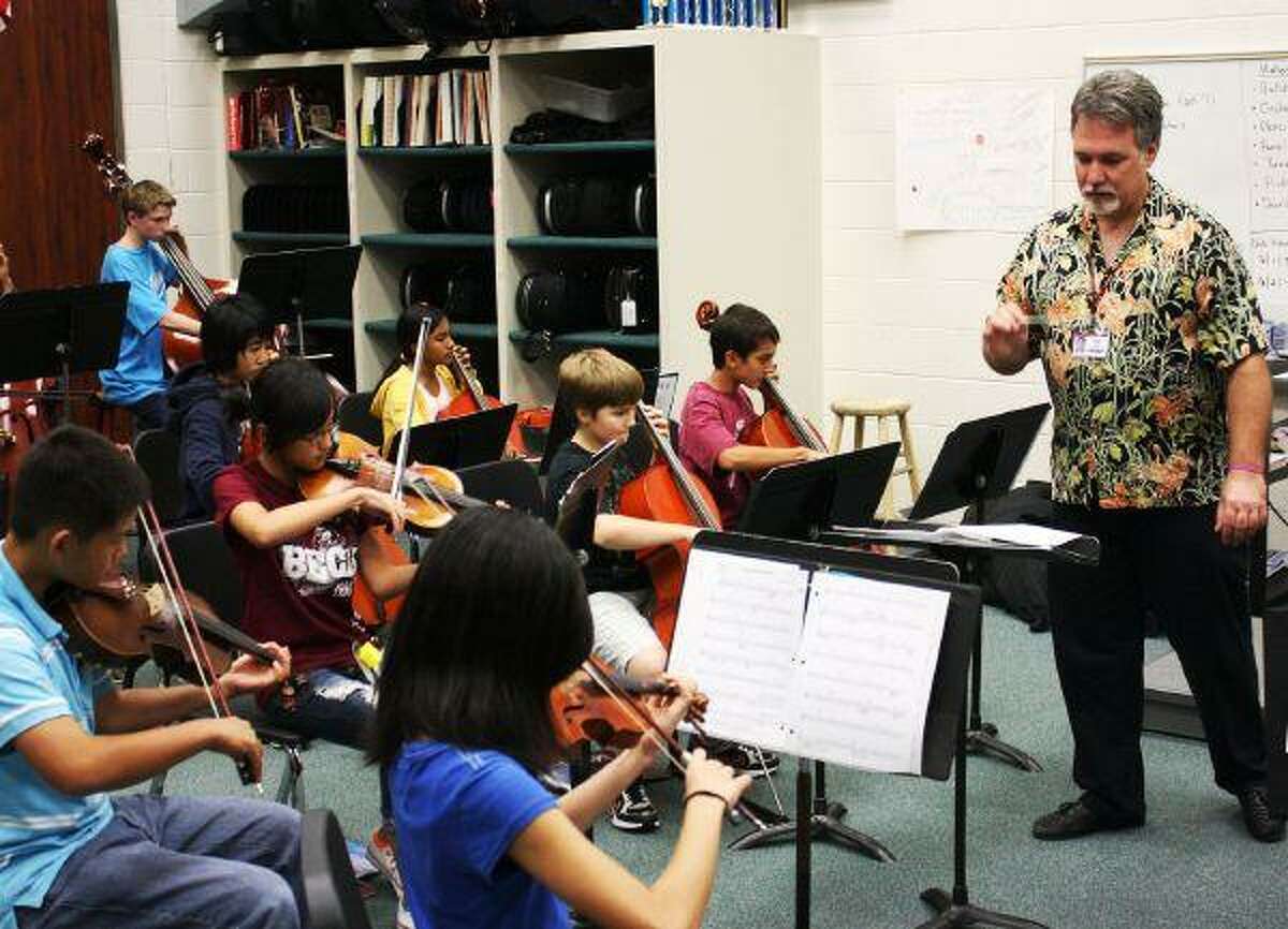 Orchestra teacher goes beyond music