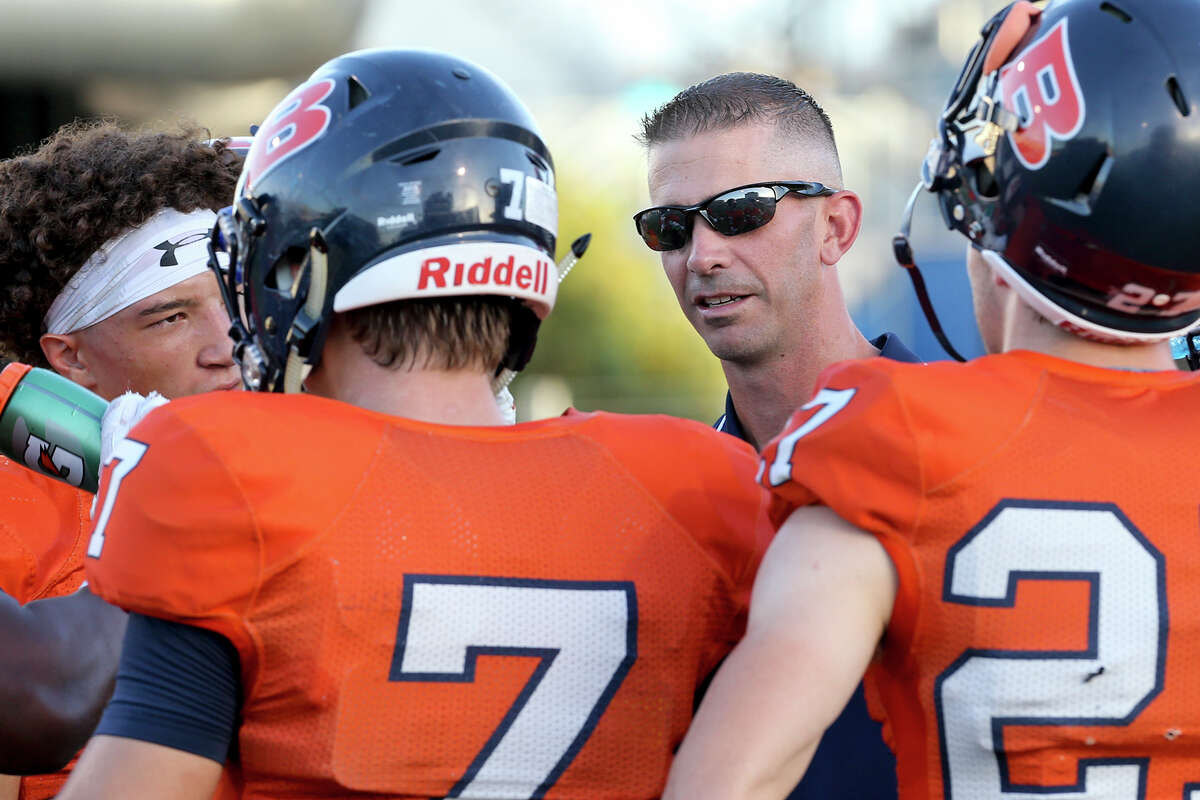 Brandeis coach Jeff Fleener talks to his players before their game against Boerne Champion at Farris Stadium on Sept. 9, 2016.