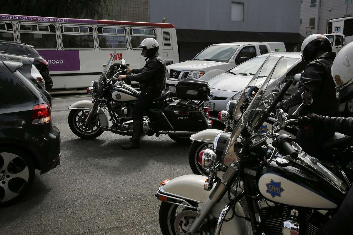 San Francisco Police Officers pull out onto Folsom street to participate in a demonstration for the media meant to catch speeders Sept. 29, 2016 in San Francisco, Calif. SFPD along with SFMTA and Vision Zero announced a renewed effort to catch city speeders by the SFPD.