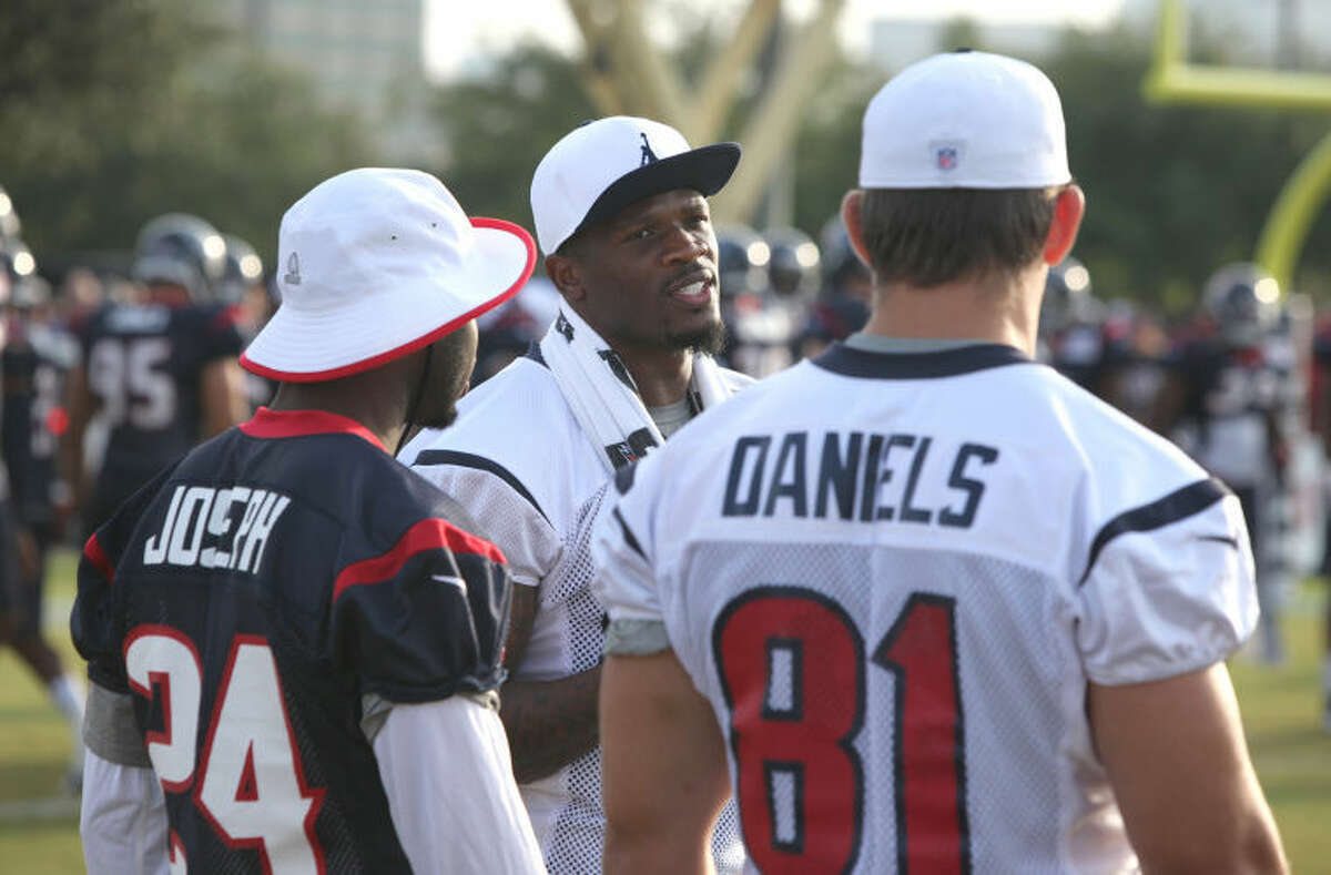 Houston Texans veterans Johnathan Joseph, Andre Johnson and Owen Daniels get to take it easy during practice Aug. 2 at the Houston Methodist Training Center.