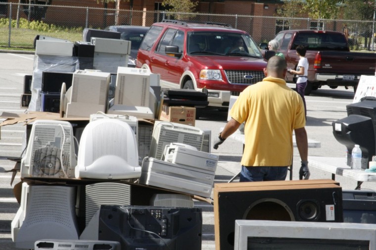 Dozens of residents recycle their electronics to benefit the What IF