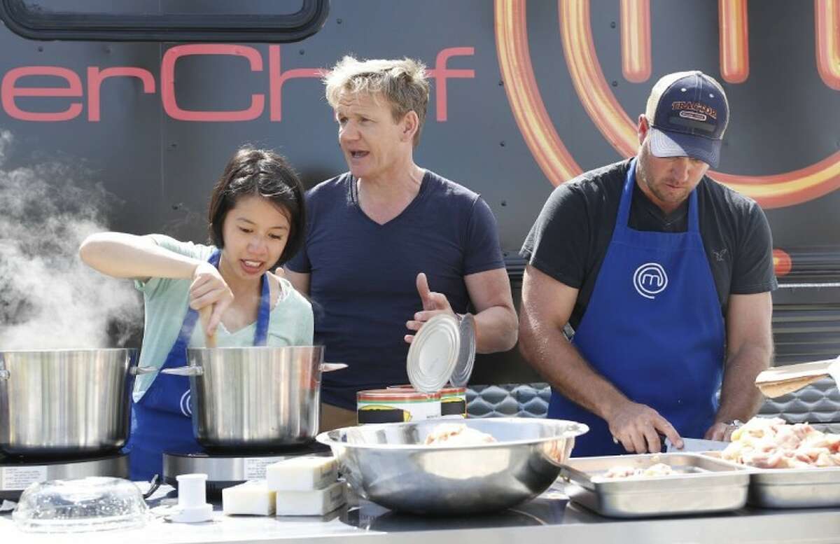 Left to right, contestant Christine Ha, Gordon Ramsay and contestant Mike Hill on the “MasterChef” episode that aired on July 2. Ha went on to win the show.