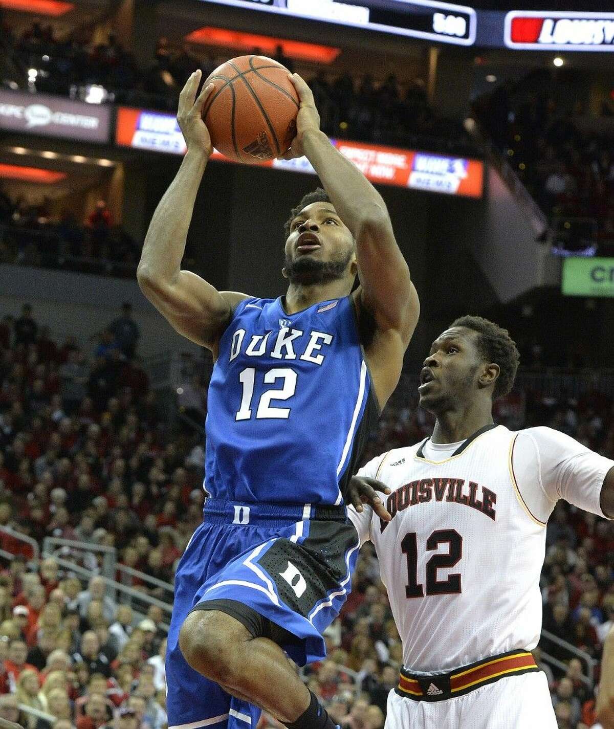 Louisville basketball bringing back dunking Cardinal logo