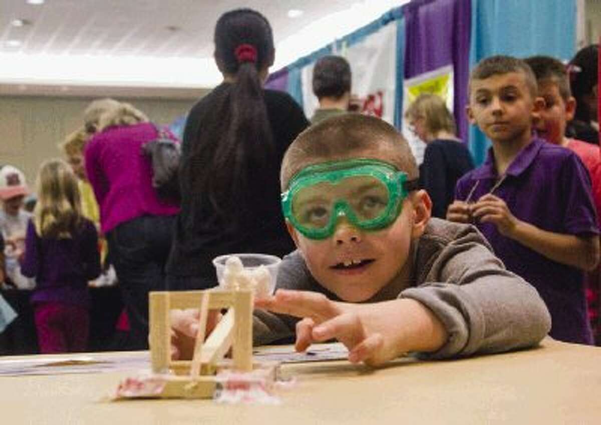 Ann K. Snyder Elementary School student Nick Moylan, eight, tests out a marshmallow catapult during Saturday’s Elementary School Science Festival in the second day of events at the SCI://TECH Exposition hosted by Education for Tomorrow Alliance in the Lone Star Convention & Expo Center in Conroe. The annual event is the largest science fair in Texas and one of the largest regional science fairs in the country. To view or purchase this photo and others like it, visit HCNpics.com.