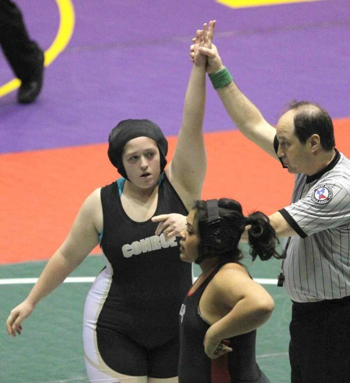 Conroe's Rebecka Winton defeated Trinity's Vanely Chairez during a match at the UIL State Wrestling Championship in Garland Friday. To view or purchase this photo and others like it, visit HCNpics.com.