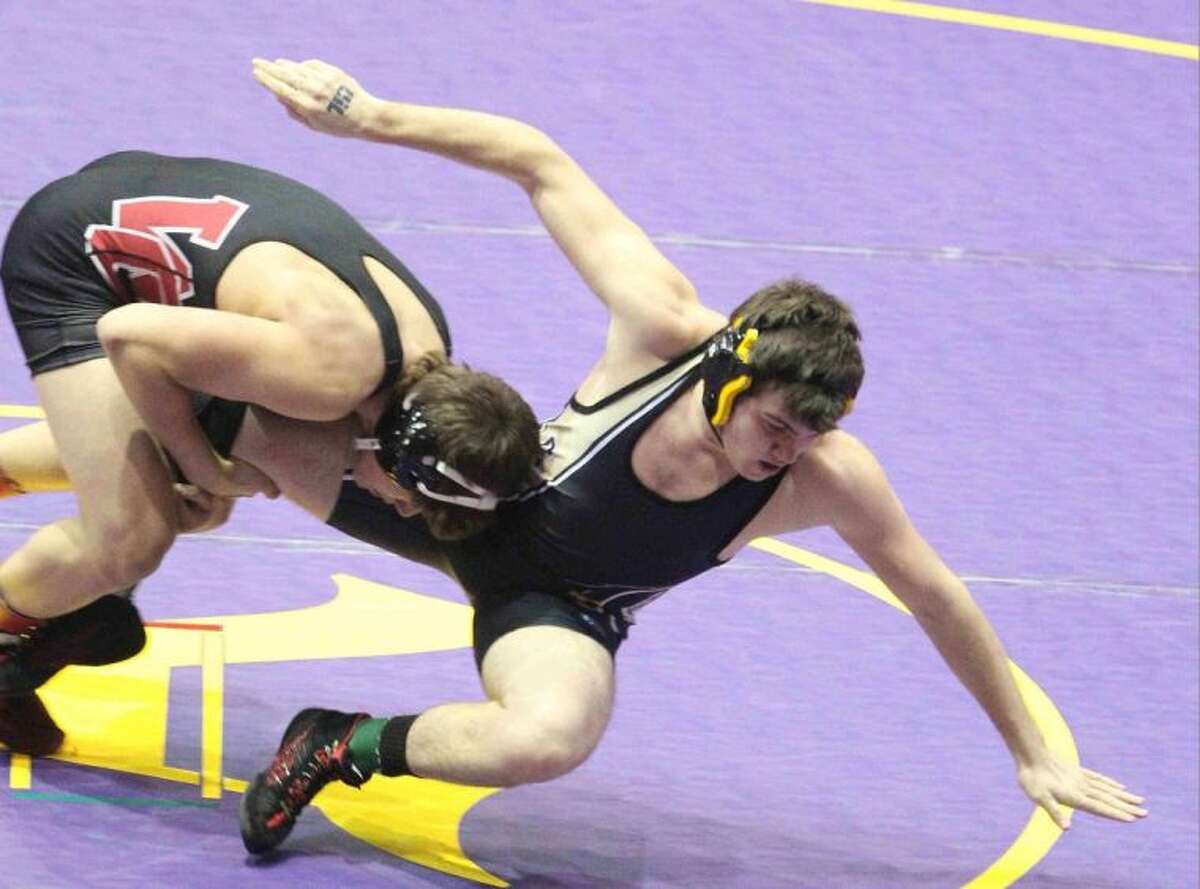 Conroe's Connor Webber wrestles during a match at the UIL State Wrestling Championship in Garland Friday.