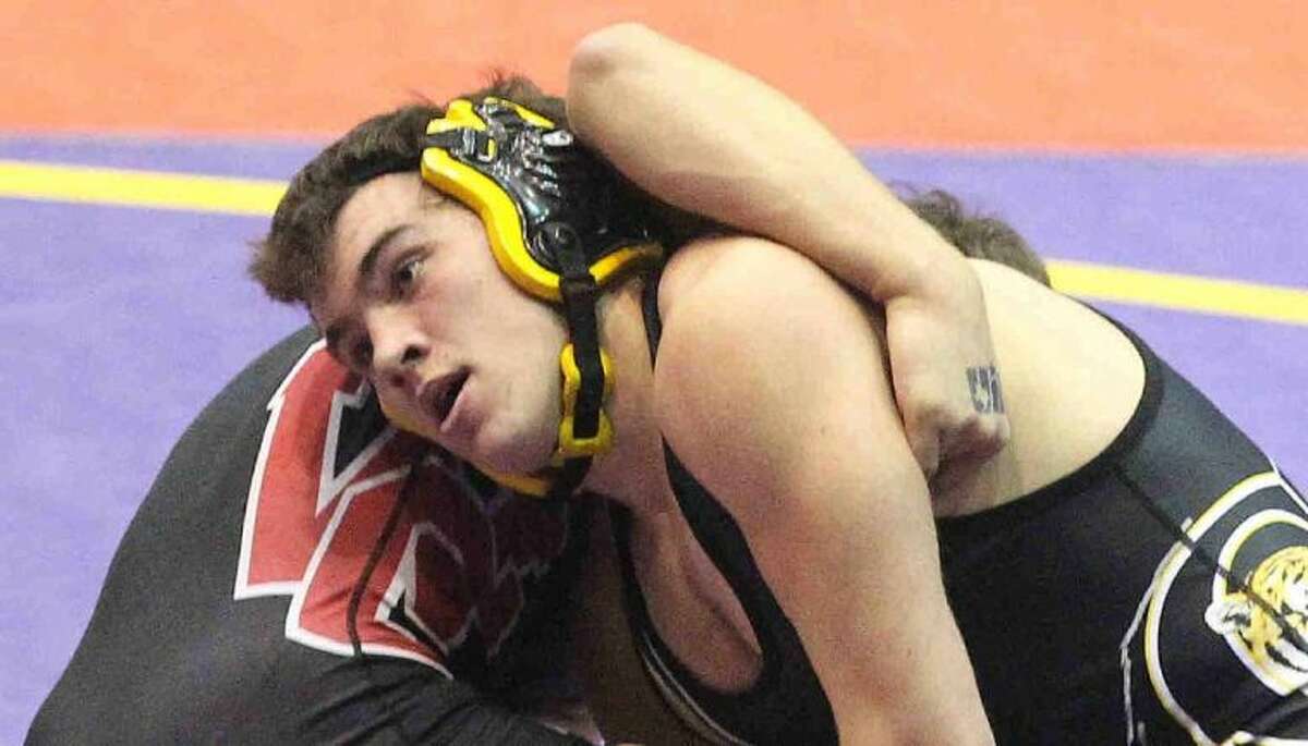 Conroe's Connor Webber wrestles during a match at the UIL State Wrestling Championship in Garland Friday.
