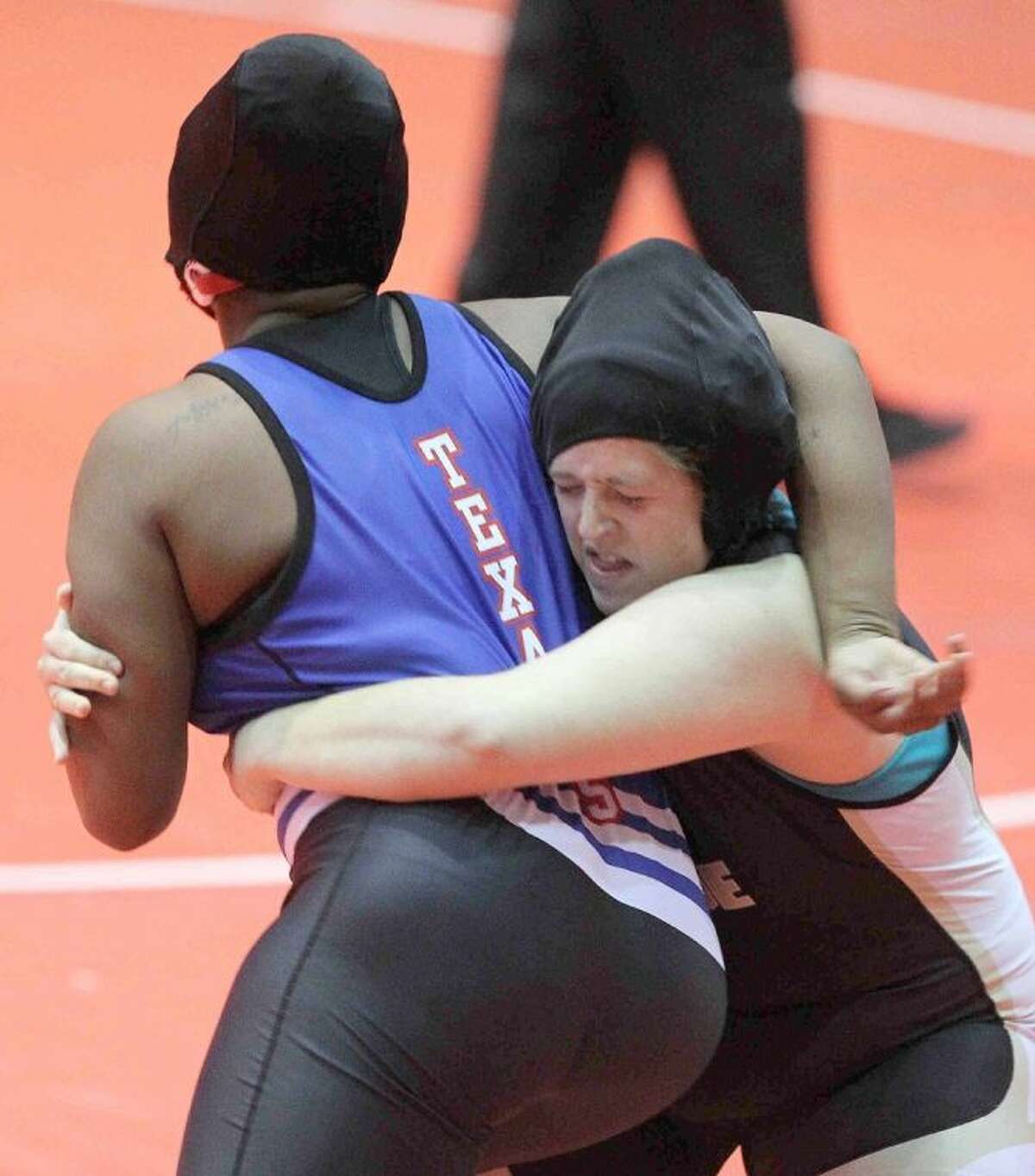 Conroe's Nicola Newton wrestles during a semifinal match at the UIL State Wrestling Championship in Garland Friday.
