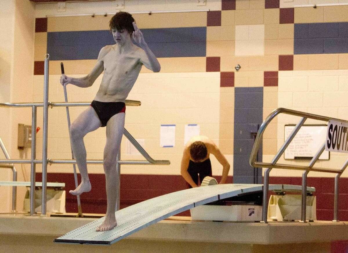 Magnolia's William Johnson competes in the District 20-5A dive meet in Friday, Jan. 22, 2016, in Shenandoah.